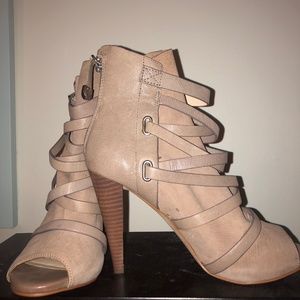 Peep toe high heeled booties